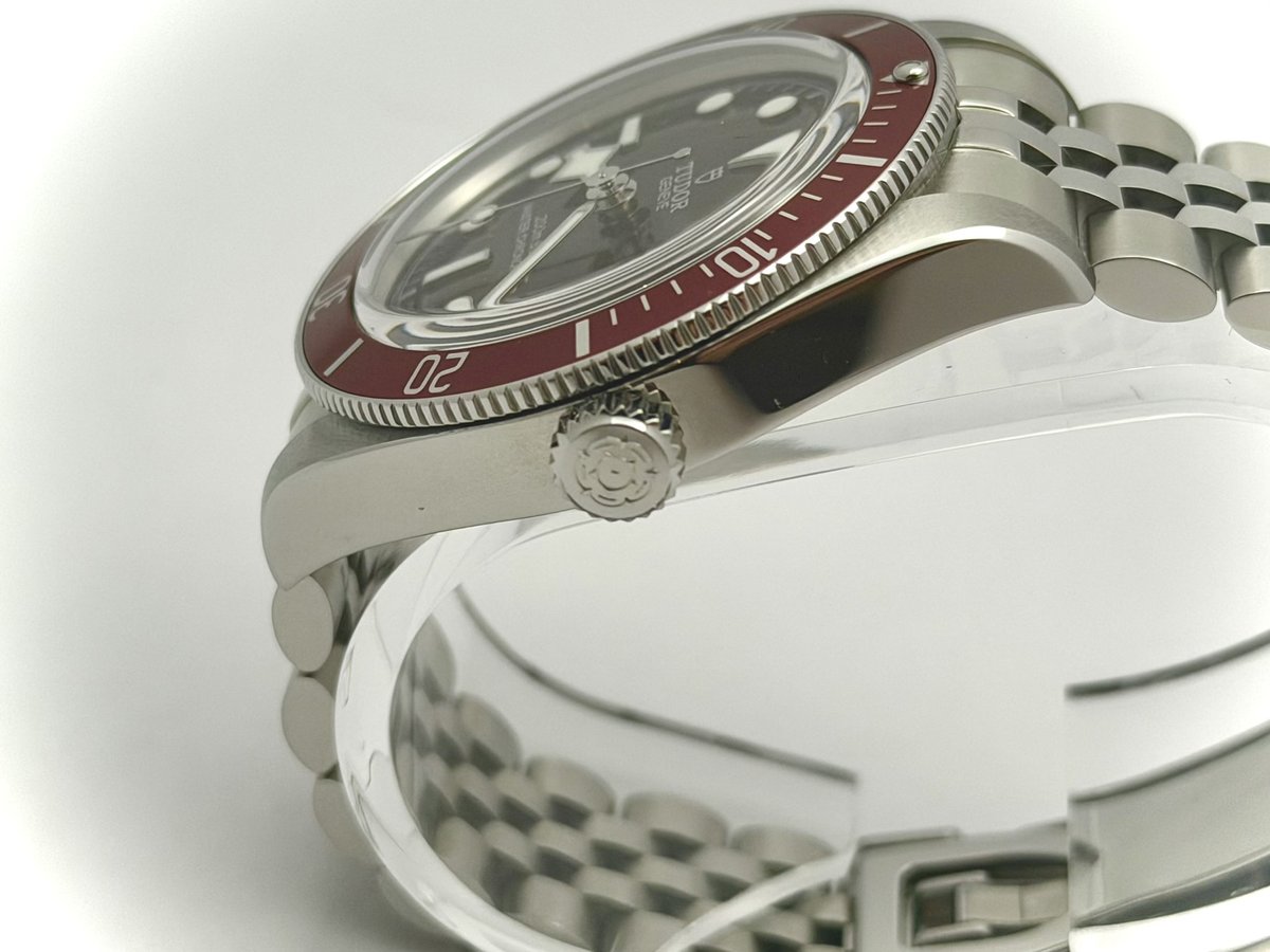 Tudor Black Bay burgundy bezel three-quarter angle on stand — SEANIC Select inventory